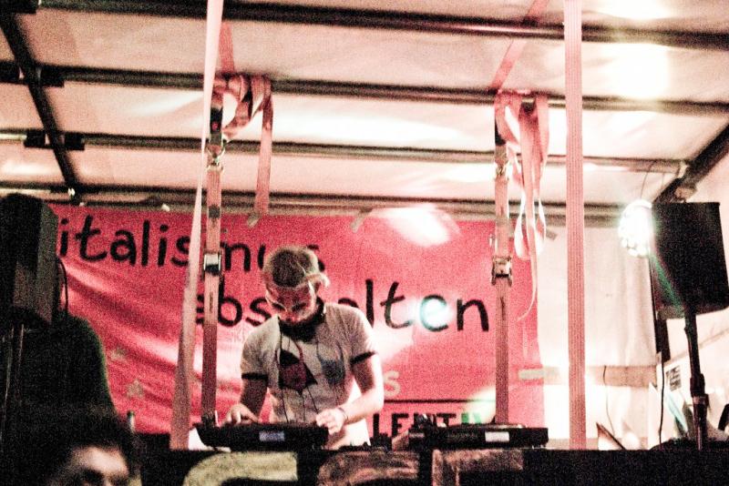 One of the DJs on one of the sound trucks at a night demo in Mainz, Germany. One of the DJs on one of the sound trucks at a night demo in Mainz, Germany.