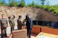 North Korean leader Kim Jong-un and officials during the test-launch of an intercontinental ballistic missile last week.