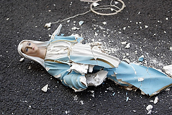 A statue of Mary lies destroyed on the ground during a demonstration against banking and finance outside the Church of Sts. Marcellinus and Peter in Rome in 2011. The church was the scene of violence during protests against the banking and finance sectors